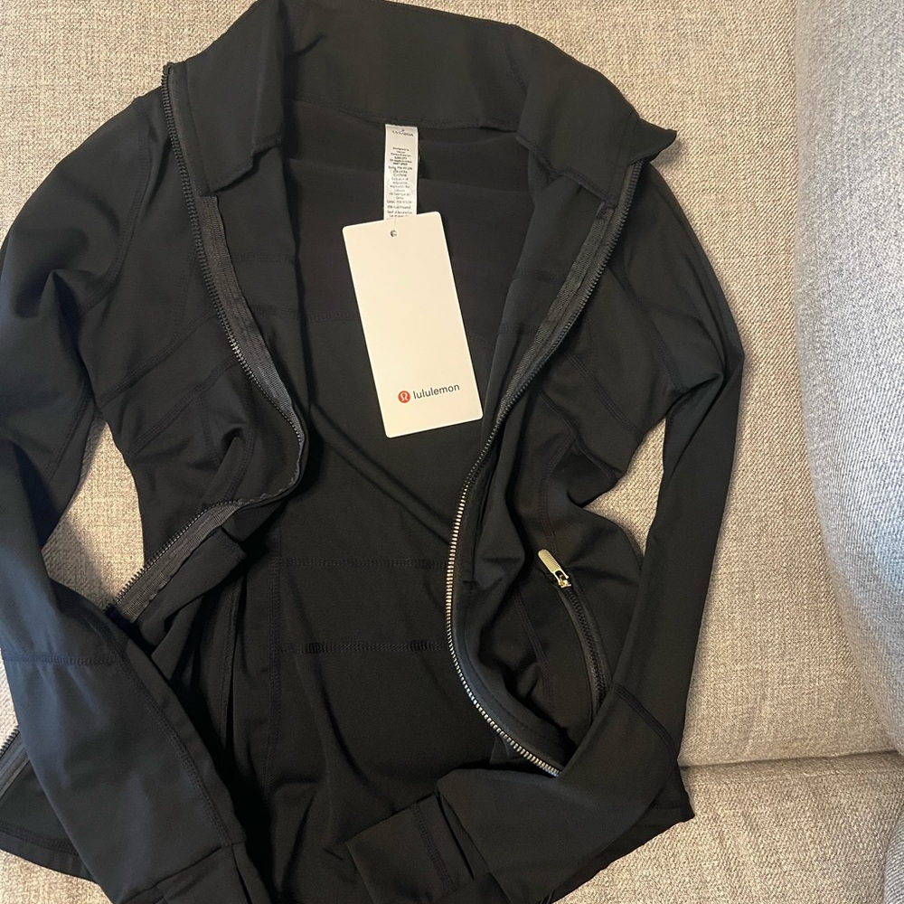 Stylish Black Jacket with Gold Accents